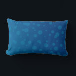 Blue rectangular pillow with a pattern of varying<br><div class="desc">Blue rectangular pillow with a pattern of varying-sized circles, creating a playful and calming design. The background appears in a solid blue shade.</div>