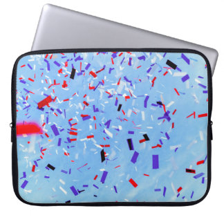 Blue, red, and black paper cutouts laptop sleeve
