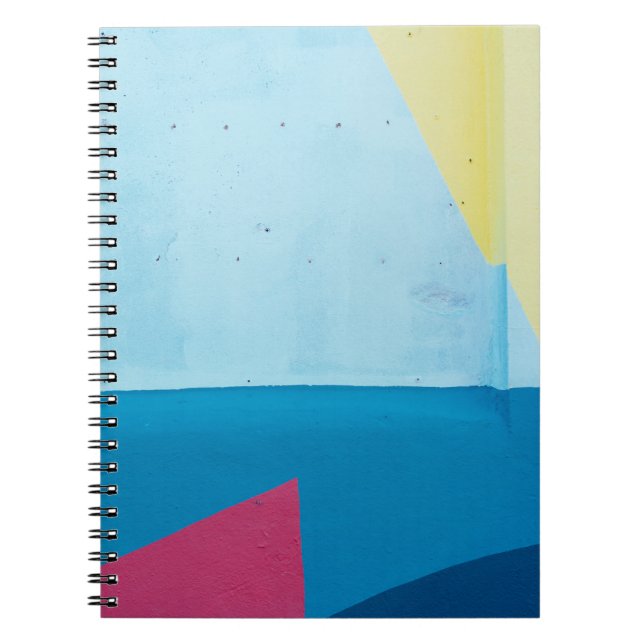 Blue, red, pink, and yellow abstract painting notebook (Front)
