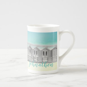 Blue retirement cup with seaside beach huts
