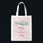 Blue Roses and Crown Floral Bouquet Wedding Reusable Grocery Bag<br><div class="desc">A wedding grocery bag designed with a photo of blue roses surrounded by sprigs and leaves and fancy baubles. The baubles also form a crown shape. White flowers and pretty blue bows and white lacy ribbon also surround the roses. Set on a dusty pink marble background.</div>