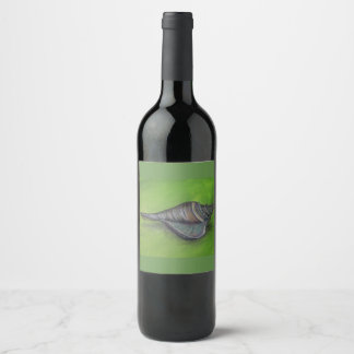blue seashell on green wine label