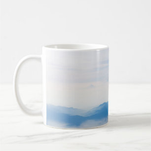 Blue sky and mountains view from airplane stylized coffee mug