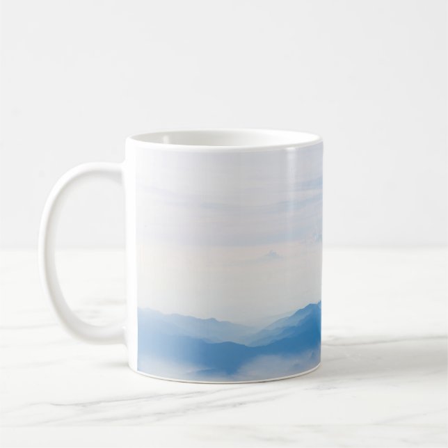 Blue sky and mountains view from airplane stylized coffee mug (Left)