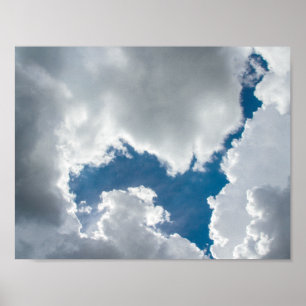 Blue sky and sunlit clouds poster