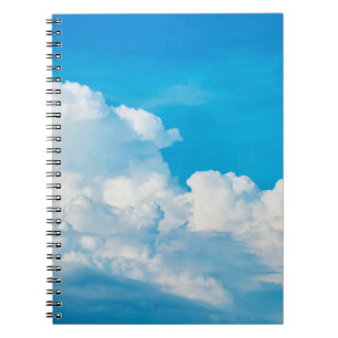 Blue sky background clouds white notebook