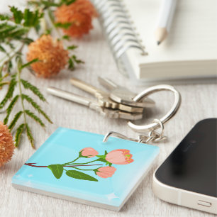 Blue sky gradient with blooming spring branch key ring