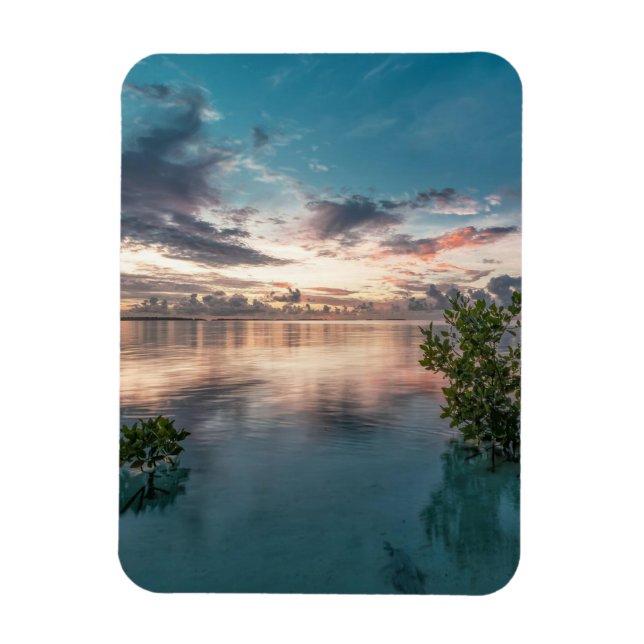 blue sky with red and dark clouds reflected on sea magnet (Vertical)