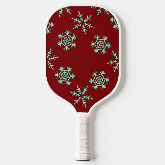 Blue snowflakes on red pickleball paddle (Front)