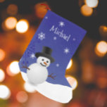 Blue Snowman Winter Scene Christmas Stocking<br><div class="desc">Bring classic holiday cheer to your home with this Blue Snowman Winter Scene Personalised Stocking. Featuring a charming snowman and top hat surrounded by falling snow and delicate white snowflakes, this design captures the magic of a snowy winter scene. Accented with festive holiday typography and a warm Merry Christmas greeting,...</div>