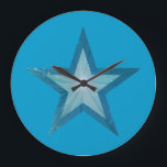 Blue Star clock round blue<br><div class="desc">Modern design with a "shining" blue and white star on a blue background. Wall clock with a customizable design for you to personalise with your own text, images and ideas. Please note that this is a printed image created using original photographs and digital techniques, it does not shine or contain...</div>