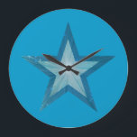 Blue Star clock round blue<br><div class="desc">Modern design with a "shining" blue and white star on a blue background. Wall clock with a customizable design for you to personalise with your own text, images and ideas. Please note that this is a printed image created using original photographs and digital techniques, it does not shine or contain...</div>