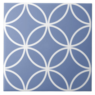 Blue tile, white repeating circle leaf pattern tile