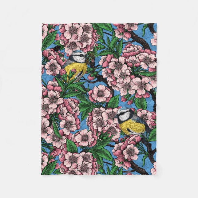 Blue tit birds in the blooming cherry tree on blue fleece blanket (Front)