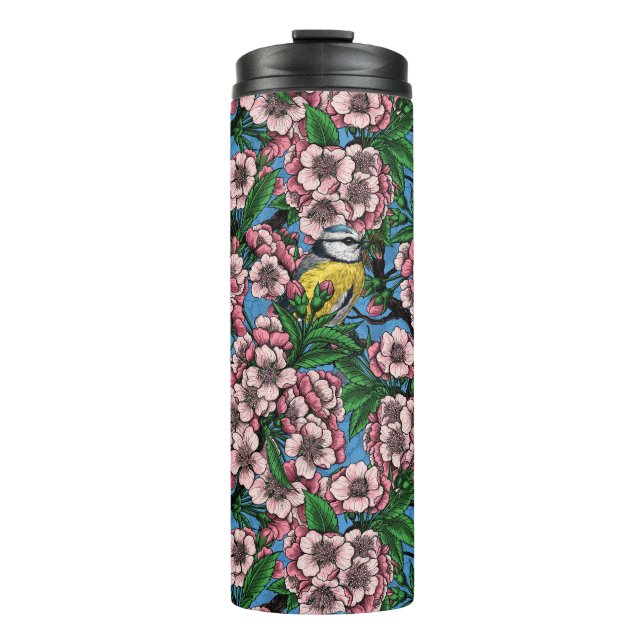 Blue tit birds in the blooming cherry tree on blue thermal tumbler (Front)