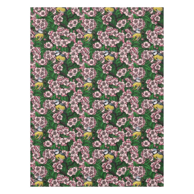 Blue tit birds in the blooming cherry tree on gree tablecloth (Front)