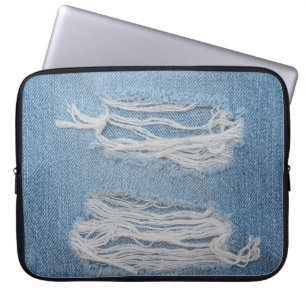 Blue torn denim jeans texture background. Stylish, Laptop Sleeve