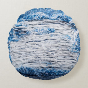 Blue torn denim jeans texture with space for text round cushion