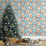 Blue Vintage Santa Claus Christmas<br><div class="desc">Bring the magic of the holidays into your home with this blue vintage Santa Claus Christmas wallpaper. Featuring charming illustrations of Santa's cheerful face and delicate snowflakes against a blue background, this design adds a festive and nostalgic touch to any room. Perfect for creating a cosy and merry atmosphere, this...</div>
