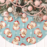 Blue Vintage Santa Claus Face Watercolor<br><div class="desc">Add a touch of nostalgic charm to your holiday decor with our Blue Vintage Santa Claus Face Watercolor Tree Skirt! This festive tree skirt features a delightful watercolor pattern of classic Santa Claus faces set against a vibrant background, adorned with delicate snowflakes. Perfect for bringing a warm and joyful atmosphere...</div>