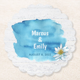 blue watercolor splash on whitewashed wood paper coaster