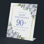 Blue White Gold Floral 90th Birthday Welcome Pedestal Sign<br><div class="desc">Honour a special woman with this elegant and feminine 90th Birthday Party welcome sign. 90th is written in large blue text. Birthday celebration follows. The honoured guest's name is also in blue capital letters. The birthday celebration details are surrounded by a chic gold frame that is decorated with white roses...</div>