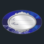 Blue White Holiday Custom Gift Tag Stickers<br><div class="desc">This custom gift tag has script letters on a silver medallion against winter holiday art with an elegant pattern of pine boughs and pinecones in blue and white on an icy background of blues and violet.</div>