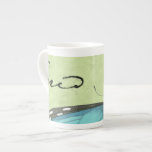 Blue-Winged Butterfly on Teal Postcard Bone China Mug<br><div class="desc">This teal postcard carries a message of beauty. A delicate blue-winged butterfly rests on the card,  obscuring some of the script it contains. This Vision Studio print would make a great addition to your home!</div>
