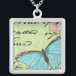 Blue-Winged Butterfly on Teal Postcard Silver Plated Necklace<br><div class="desc">This teal postcard carries a message of beauty. A delicate blue-winged butterfly rests on the card,  obscuring some of the script it contains. This Vision Studio print would make a great addition to your home!</div>