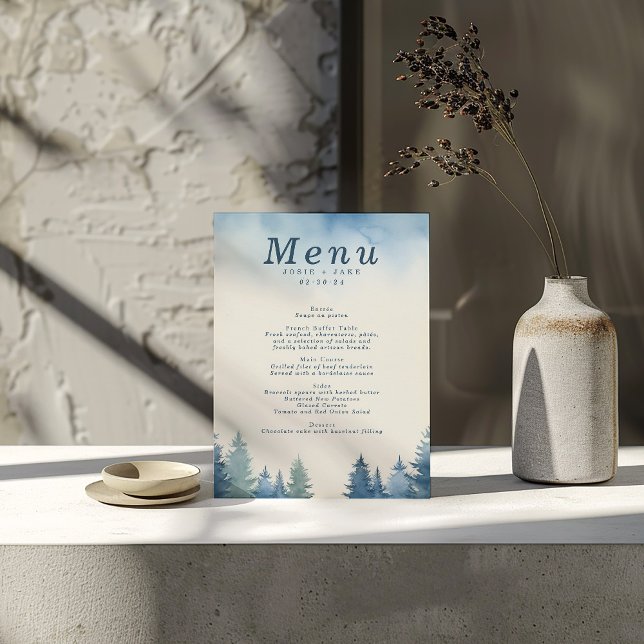 Blue winter pine trees wedding menu (Winter blue pine trees wedding table menu showing all the courses)