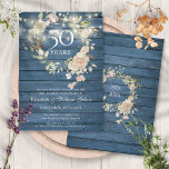 Blue Wood String Lights Floral 50th Anniversary Invitation<br><div class="desc">Featuring pretty string lights and a delicate watercolor floral greenery garland on a blue rustic wood background,  this chic botanical 50th wedding anniversary invitation can be personalised with your special wedding anniversary information. The reverse features a matching floral garland framing your anniversary dates in elegant typography. Designed by Thisisnotme©</div>