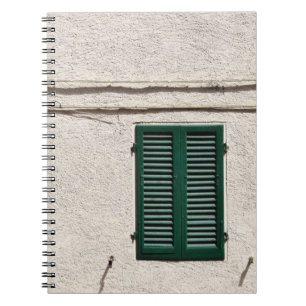 BLUE WOODEN WINDOW ON WHITE CONCRETE WALL NOTEBOOK