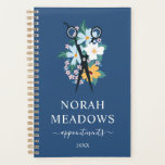 Blue Yellow Floral Scissors Appointments Planner<br><div class="desc">Floral appointment book for a hair salon, hair stylist, seamstress, tailor or similar with a pair of scissors resting on a bed of wildflowers in blue, white, yellow, and pale pink. Add your name or business name in large white letters above appointments written in a charming white script against a...</div>