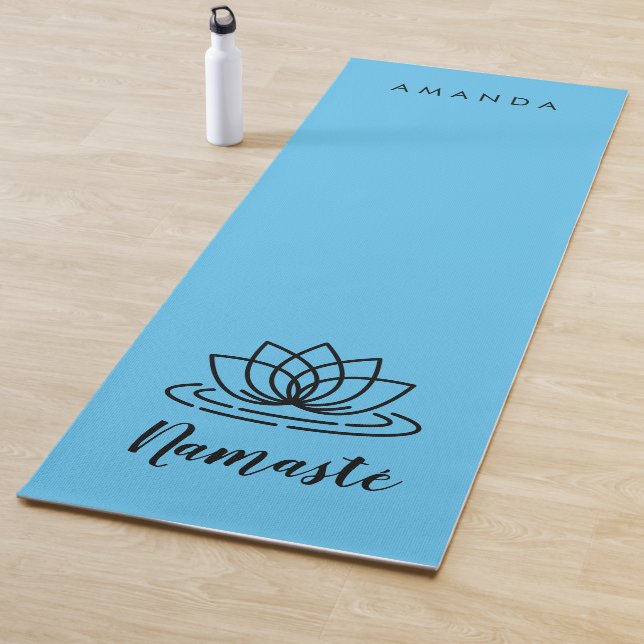 Blue yoga mat with lotus for teacher or instructor (In Situ)