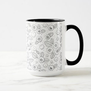 Blueberries on black and white mug