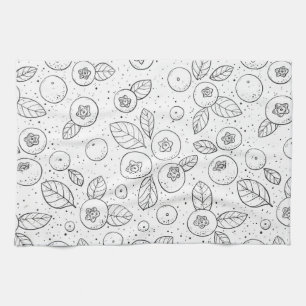 Blueberries on black and white tea towel