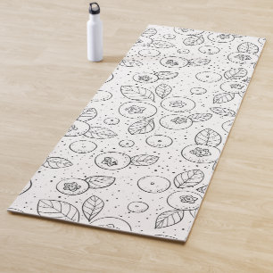 Blueberries on black and white yoga mat