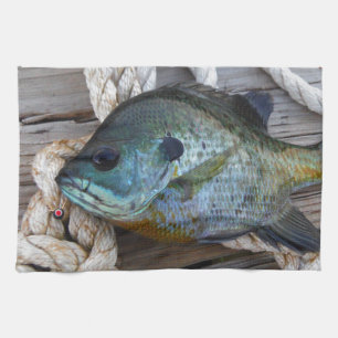 Bluegill fish on dock and rope tea towel