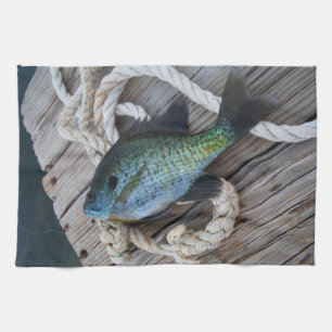 bluegill on dock tea towel