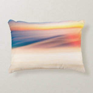 Blur tropical sunset beach with bokeh sun light wa decorative cushion
