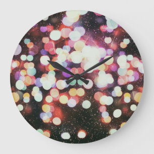 Blurred concert lights: defocused entertainment. large clock