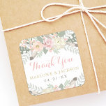 Blush Pink and Gold Floral Boho Wedding Thank You Square Sticker<br><div class="desc">Boho style wedding favour sticker features Thank You in script with a monogram that can be personalised,  framed with romantic spring flowers,  botanical leaves,  and rustic bird feather accents. Soft colour scheme includes shades of pink,  peach,  cream,  green,  grey,  and gold. Perfect for a spring or summer event.</div>