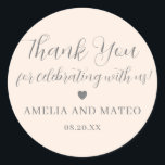 Blush Pink Calligraphy Wedding Thank You Favour Classic Round Sticker<br><div class="desc">The perfect little something to seal your wedding favour box or thank you note. The thank you sentiment is written in a playful script font then your name and wedding date are in a classic serif text. A sweet heart separates them. This item is part of the Elegant Minimalist Wedding...</div>