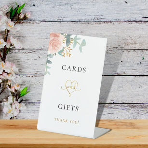 Blush pink floral eucalyptus greenery  cards gifts pedestal sign