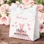 Blush Pink Floral Quinceañera Butterflies Favour Box<br><div class="desc">Make your quinceañera extra special with Blush Pink Floral Quinceañera Butterflies Favour Boxes. These charming boxes feature a soft blush pink design adorned with delicate floral accents and graceful butterflies, symbolising transformation and elegance. Perfect for holding small gifts or treats, these favour boxes add a touch of beauty to your...</div>