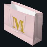 Blush Pink & Gold Modern Letter Monogram Large Gift Bag<br><div class="desc">Stylish and modern gift bag featuring a bold monogram design. Perfect for any occasion — weddings,  birthdays,  or special celebrations. Personalise it with your own initial and colour for a touch of elegance and charm.</div>