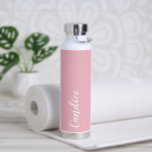 Blush Pink Personalised Wedding Bridesmaid Water Bottle<br><div class="desc">Gift your wedding bridesmaid or maid of honour with this trendy, vacuum Insulated water bottle that features her name in white, stylised script on a blush pink colour background designed to match your wedding colour scheme. Personalise bottle by editing and replacing name with your own as desired. Select your water...</div>