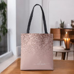 Blush Pink Rose Gold Glitter Monogram Name Tote Bag<br><div class="desc">Pink Rose Gold and Blush Pink Faux Sparkle and Glitter Elegant Monogram Book Bag. This Book Bag can be customised to include your initial and first name and given as a gift for Christmas,  Sweet 16 Birthday,  Bridal Shower or a Wedding.</div>