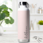Blush Pink Simple Your Name Water Bottle<br><div class="desc">Simple yet stunning.  Personalise this water bottle with your name,  or a loved ones name.  A simple elegant script typography with a girly edge.  Change out the background and font colours to anything you want. Blush Pink Trendy Simple Your Name Minimalist Water Bottle</div>