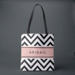 Blush Rose Pink Black White Modern Chevron Zigzag Tote Bag<br><div class="desc">Carry your things in style with this chic modern personalised tote bag. Design features a black and white chevron zig-zag pattern, a pretty blush rose pink stripe, and your name or other customised text in a simple black typography font. Text can be different on front and back of bag. This...</div>